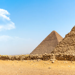 Pyramids of Giza in the desert by day